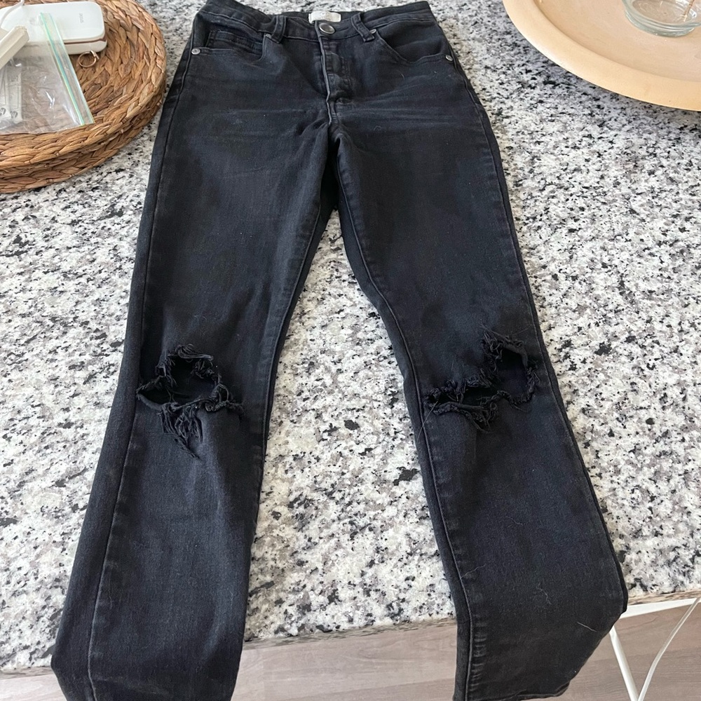 Black cotton on jeans